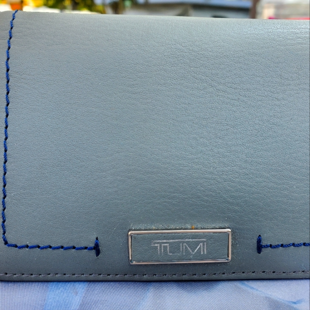 TUMI gray with blue wallet